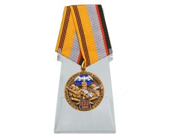 Юбилейная медаль Военной разведки к 100-летию на подставке