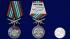 Медаль "За службу в 19 ОБрПСКр Невельск" на подставке